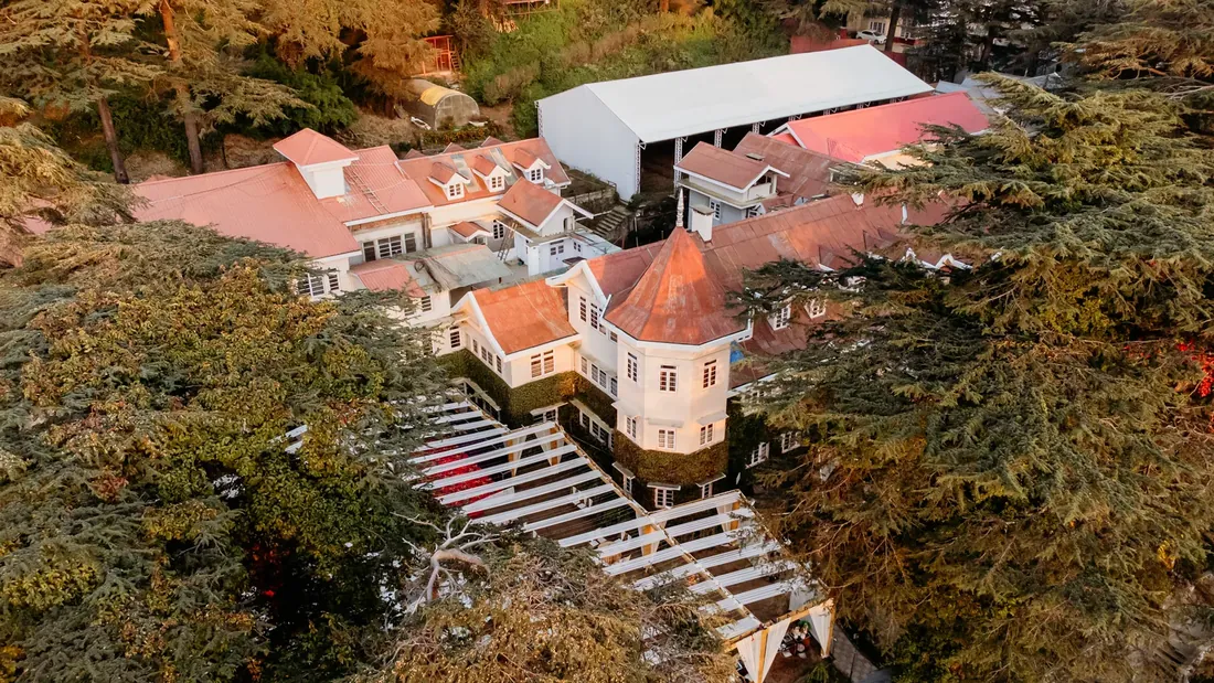 Aerial view of Woodville Palace Shimla with wedding marquees set across the estate