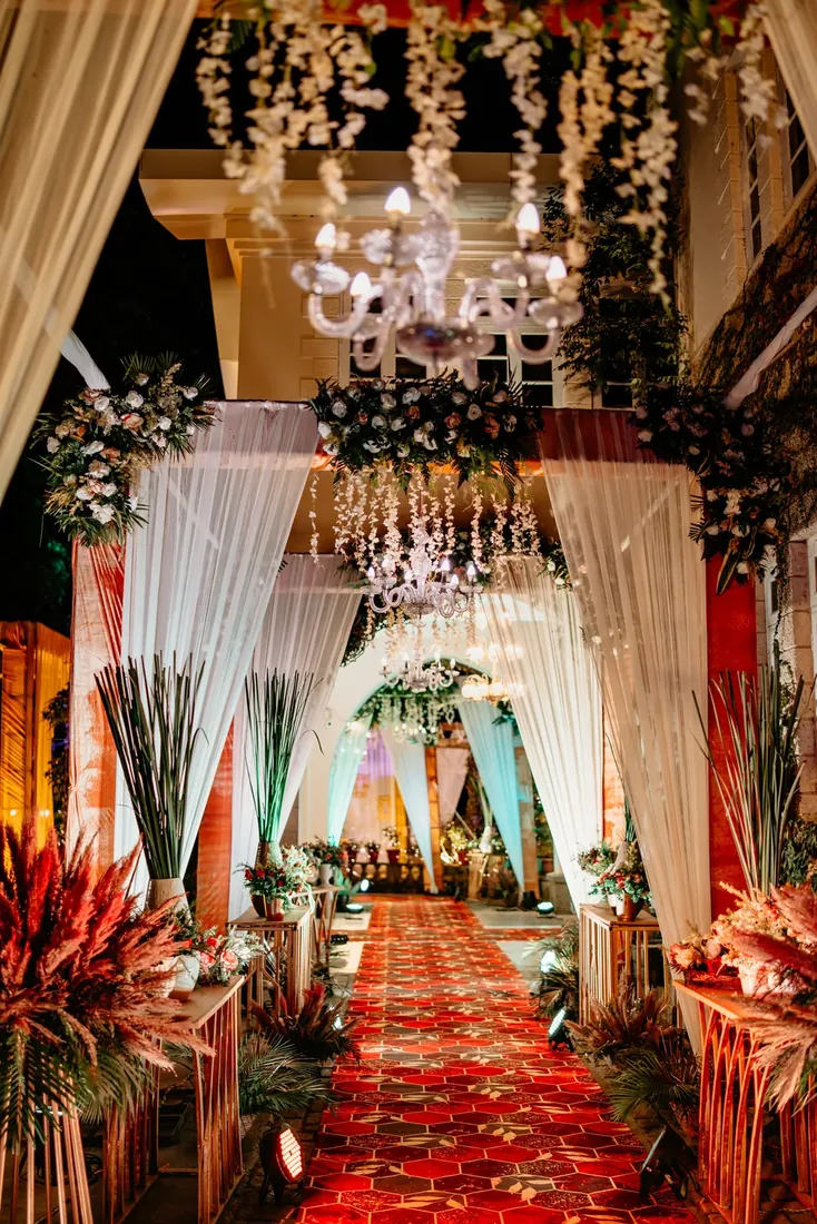 Evening engagement decor at Woodville Palace Shimla — white drapes, fairy lights and gold chiavari chairs
