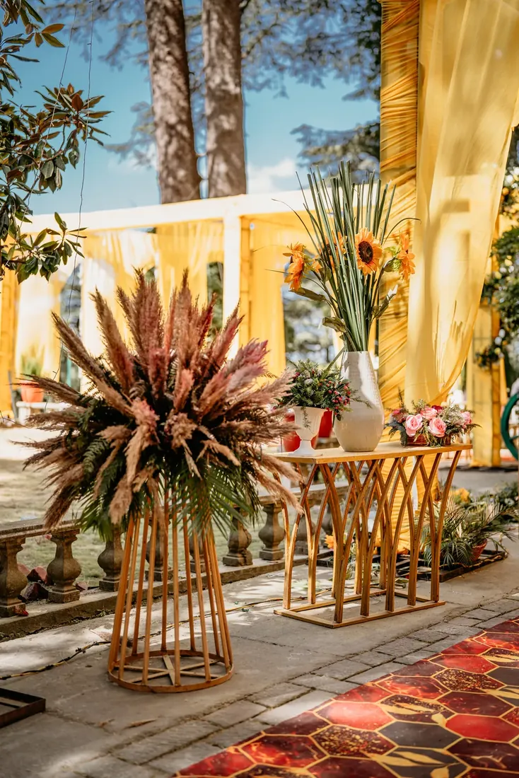 Haldi ceremony decor at Woodville Palace Shimla — sunflowers, marigold and yellow drapes on the palace lawn
