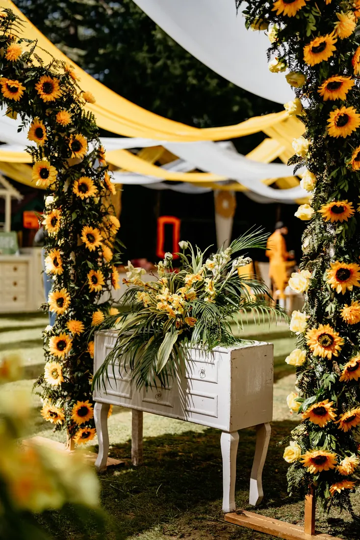 Haldi ceremony decor at Woodville Palace Shimla — sunflowers, marigold and yellow drapes on the palace lawn