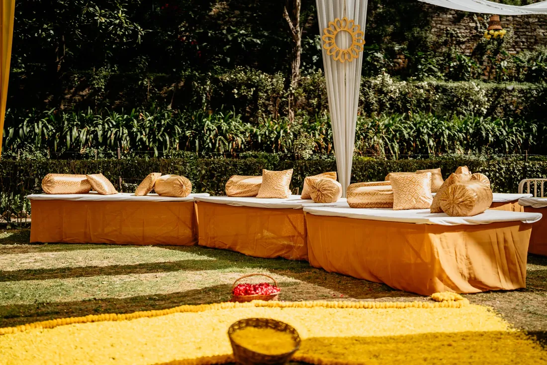 Haldi ceremony decor at Woodville Palace Shimla — sunflowers, marigold and yellow drapes on the palace lawn