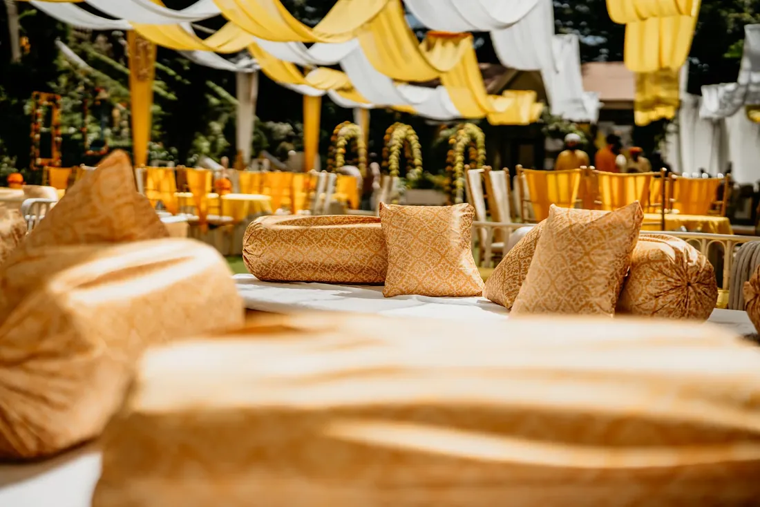 Haldi ceremony decor at Woodville Palace Shimla — sunflowers, marigold and yellow drapes on the palace lawn